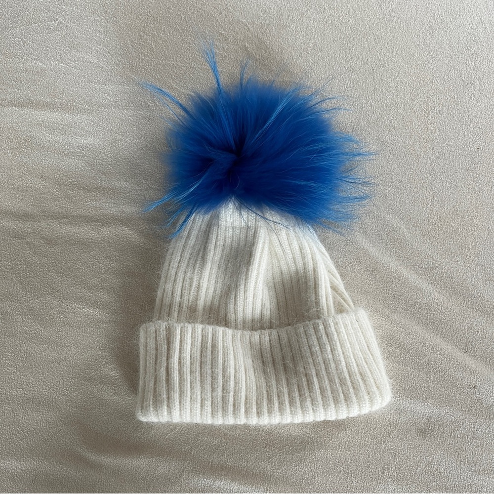Linda Richards White Hat with Blue Pom Pom